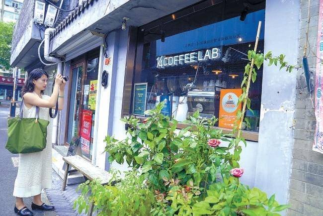 还呗下载最新版，小巷特色小店探秘之旅